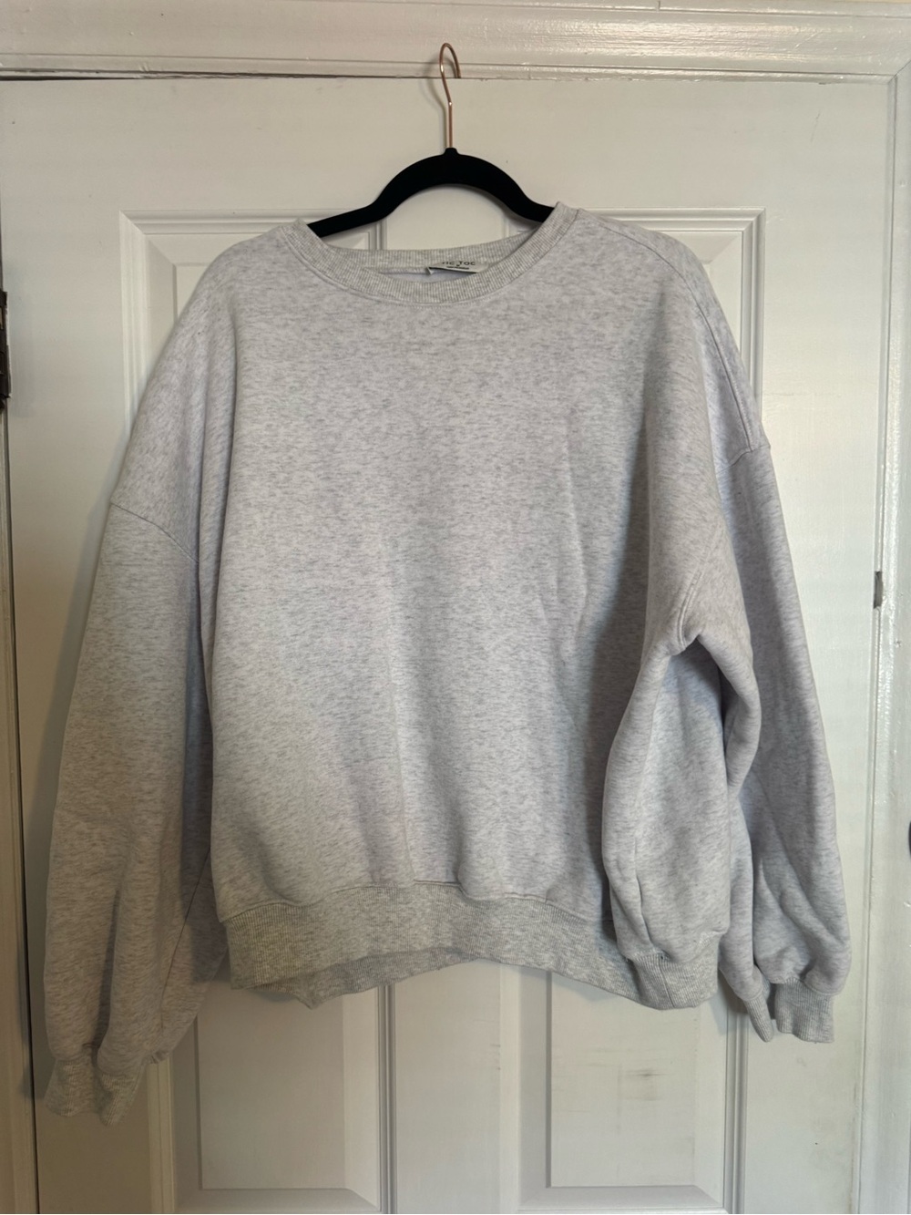 Tic toc crew neck sweater